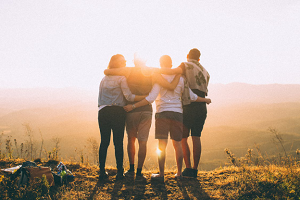 Happy friends are embracing